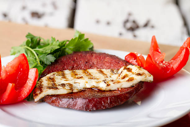 Turkish Ottoman Sausage on the White plate rustic background
