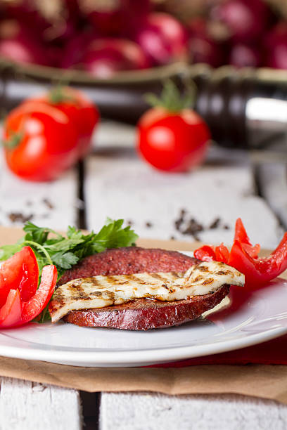 Turkish Ottoman Sausage on the White plate rustic background