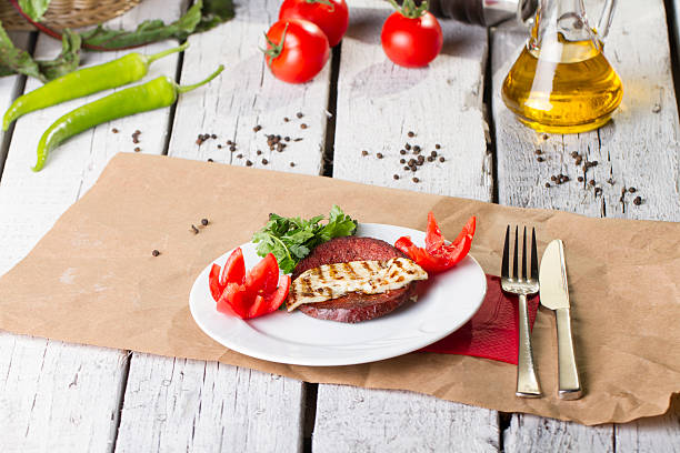 Turkish Ottoman Sausage on the White plate rustic background
