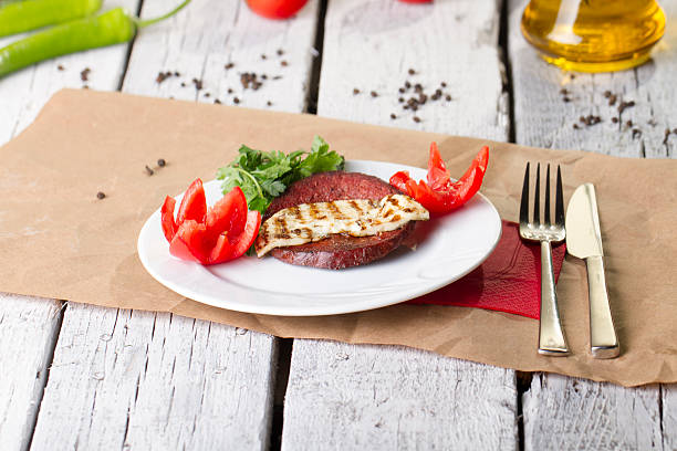 Turkish Ottoman Sausage on the White plate rustic background