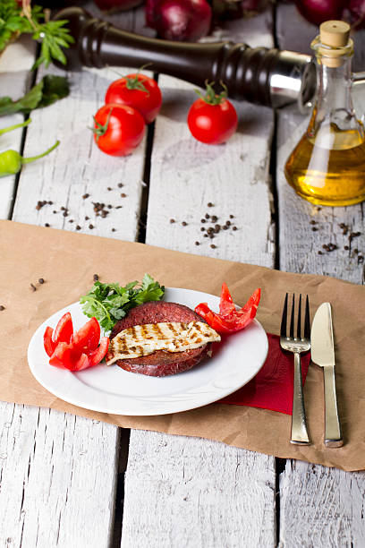 Turkish Ottoman Sausage on the White plate rustic background