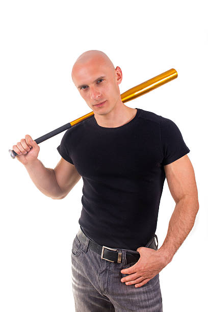 istock aggression concept - furious angry man holding baseball sport bat 531798832