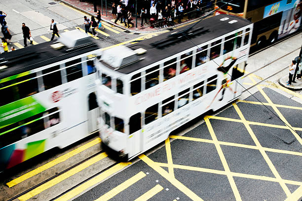Trams passing on Des Voeux Road West, Hong Kong