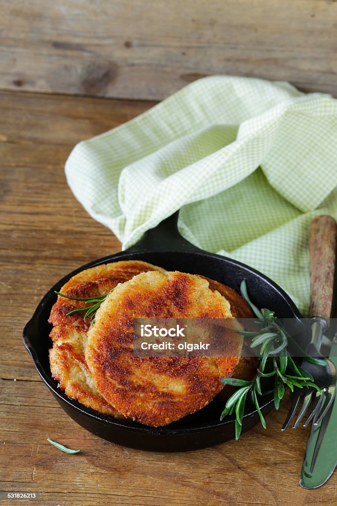 roasted meat burgers with rosemary in a pan 2015 Stock Photo