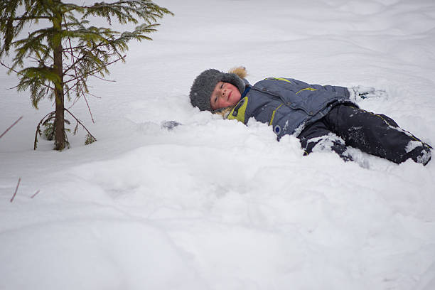 istock Happy kids enjoying riding on sledge 531827773