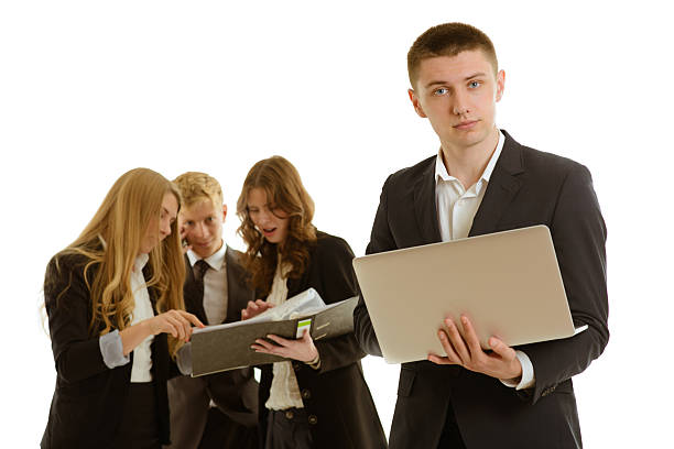 istock group of business people with laptop 531841973
