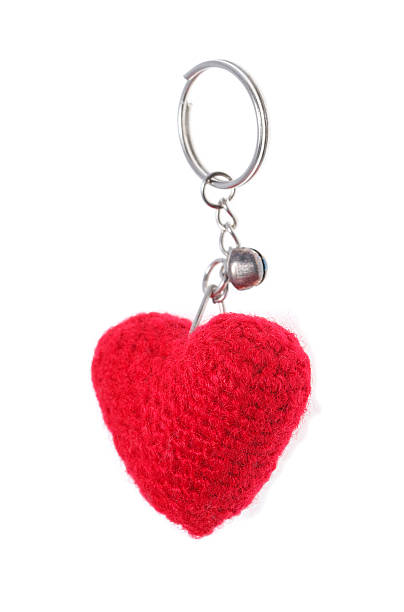 istock Clothing red heart key chain isolated on white 531842505