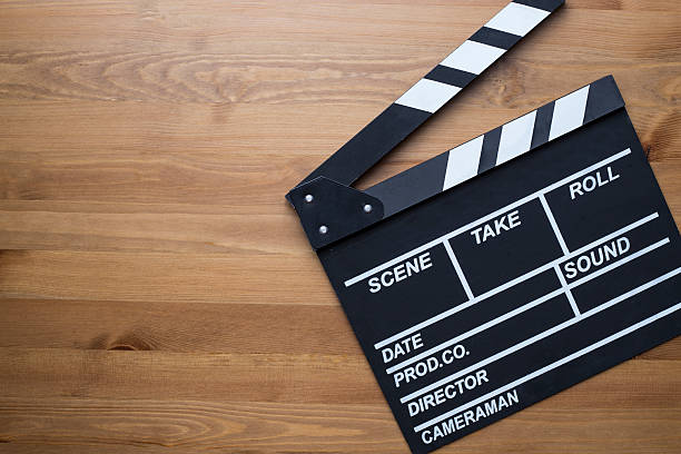 istock movie clapper on wood table 531842664