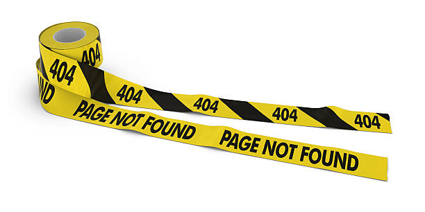 istock 404 and PAGE NOT FOUND Tape Rolls unrolled across white 531843018
