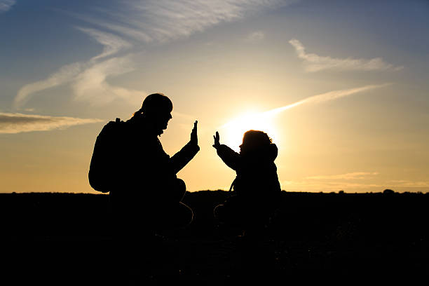 istock mother and little son travel at sunset 531844514