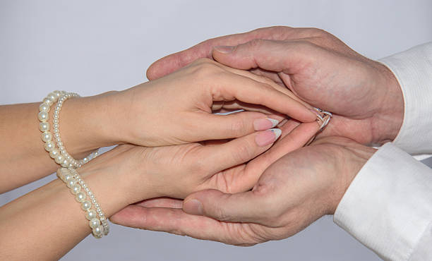 istock Female hand in caring man hands 531846007