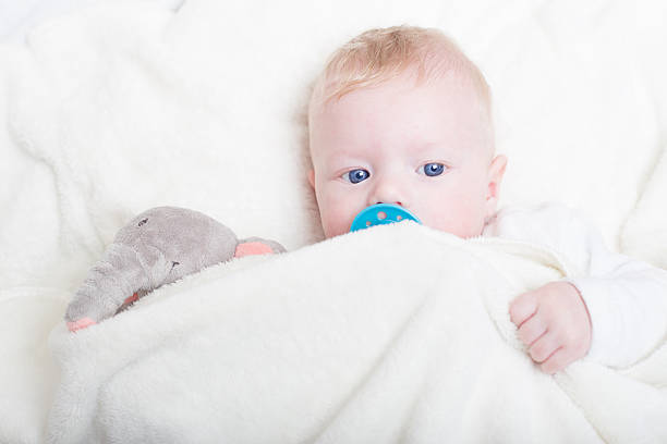 istock Baby with plush toy. 531846495