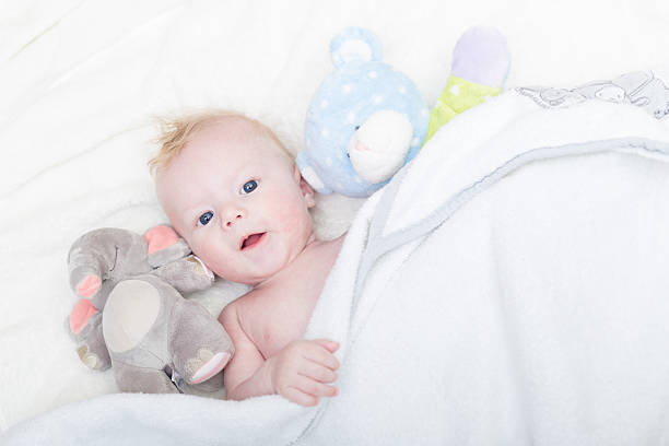istock Baby with plush toy. 531846505