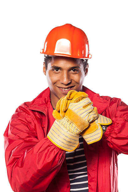 istock African worker with a helmet and a gesture of congratulations 531847081