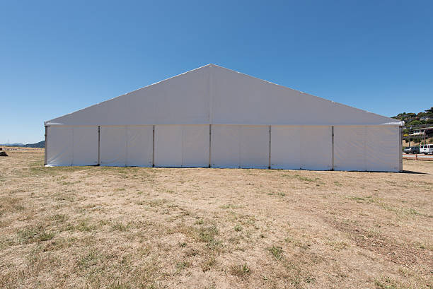 istock Large white tent for entertaining in field 531848718
