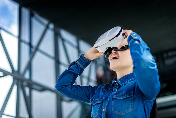 istock Woman wearing virtual reality glasses 531848858