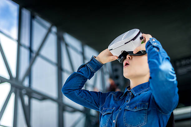 istock Woman wearing virtual reality glasses 531848928