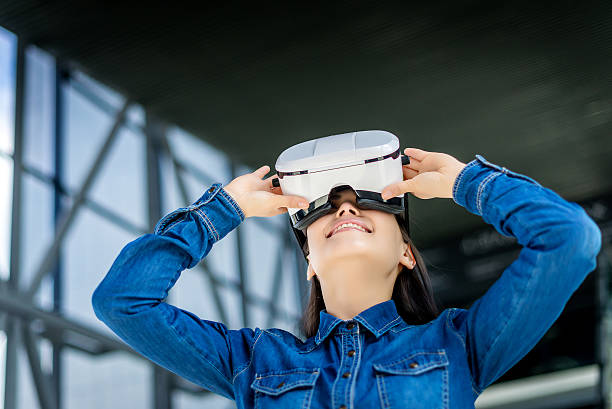 istock Woman wearing virtual reality glasses 531848988