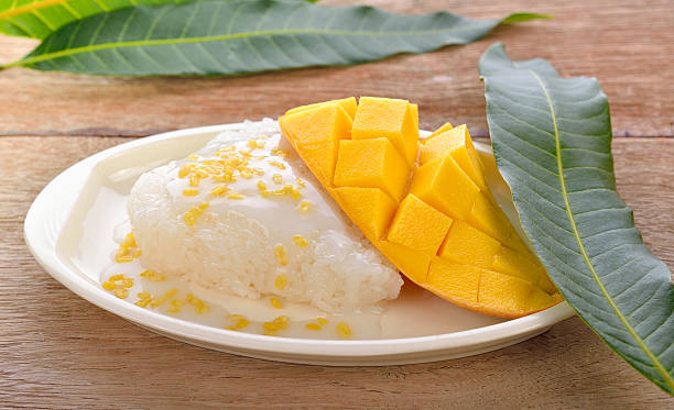 istock Thai  dessert, sticky rice with mangoes 531849118