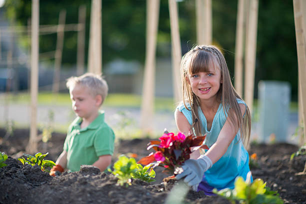 istock Little Girl Holding Flowers 531856224