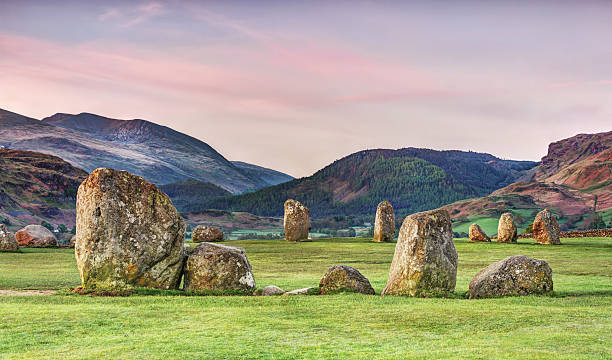 Castlerigg stone circle ,Lake District,England The stone circle at Castlerigg (alt. Keswick Carles, Carles, Carsles or Castle-rig) is situated near Keswick in Cumbria, North West England. One of around 1,300 stone circles in the British Isles and Brittany, it was constructed as a part of a megalithic tradition that lasted from 3,300 to 900 BC, during the Late Neolithic and Early Bronze Ages. keswick stock pictures, royalty-free photos & images
