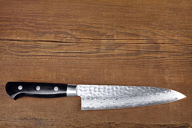 istock Japanese Professional Kitchen Knife On The Wood Cutting Board 531858158