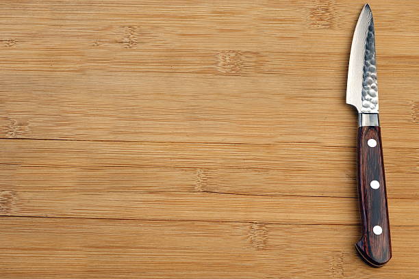 istock Japanese Professonal Kitchen Knife On The Bamboo Cutting Board 531858248