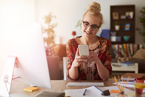 istock Checking the news in small business office 531858378