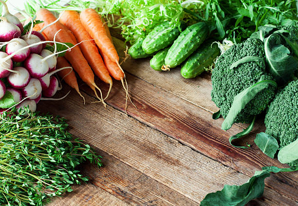 istock Fresh vegetables on wooden background 531859492