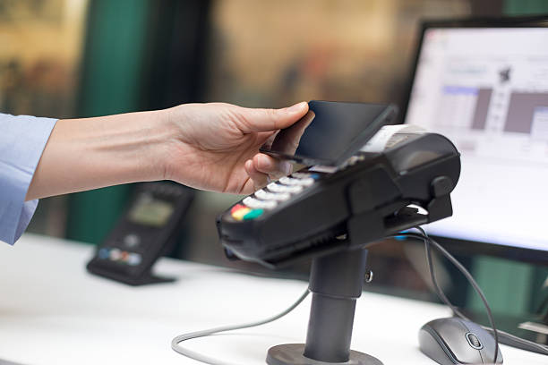 istock Contactless payment with smart phone 531861038