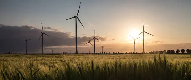 wind turbine farm sundown