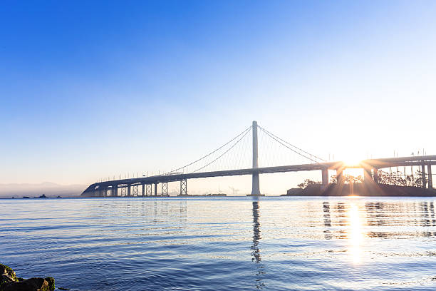 istock tranquil water and gold gate bridge at sunrise 531861174