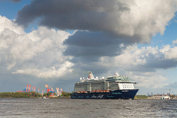 Hamburg, Germany - May 15, 2016: TUI cruise ship Mein Schiff 4 on River Elbe leaving Hamburg harbor