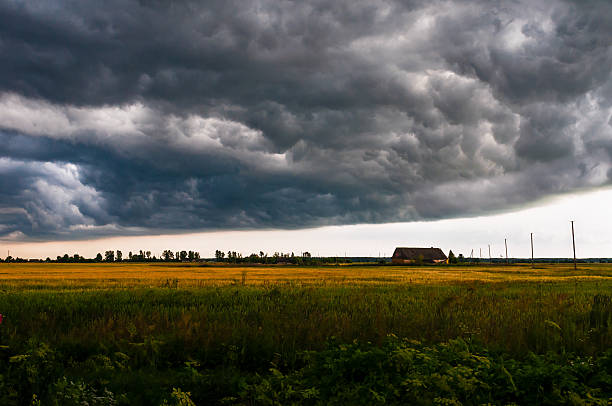 istock Storm clouds are approaching and hanging over the lonely cottage 531861668