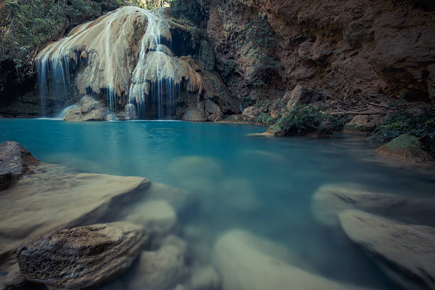 istock wonderful waterfall with colorful tree in thailand 531862074