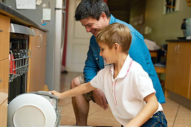 istock Teaching his son to tackle some chores 531862194