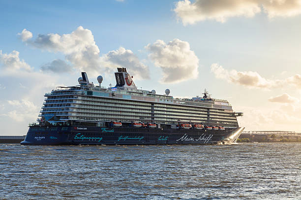 Hamburg, Germany - May 15, 2016: TUI cruise ship Mein Schiff 4 on River Elbe leaving Hamburg harbor