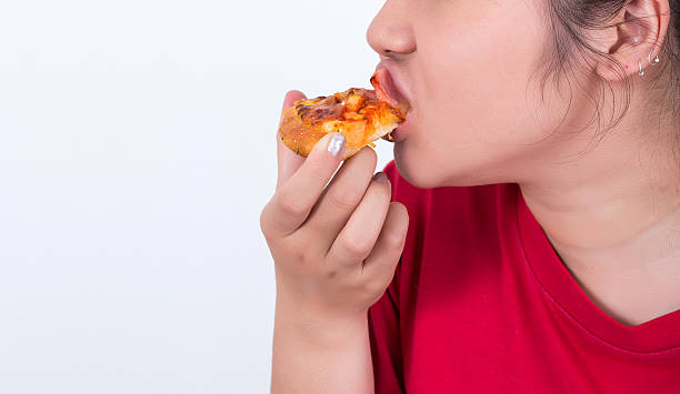 istock Woman with fast food 531863324