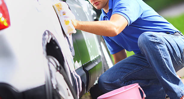 istock Man washing his car. 531864213