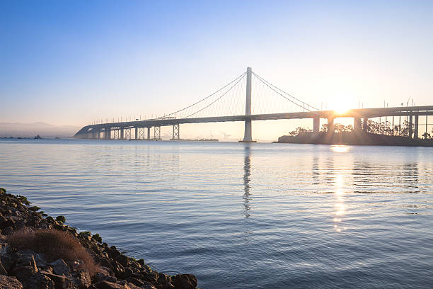 istock tranquil water and gold gate bridge at sunrise 531864358