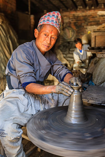 istock Nepali potter working on the pottery square in Bhaktapur 531864433
