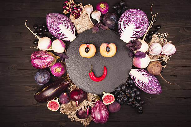 istock Purple vegetables on a wooden background 531864484