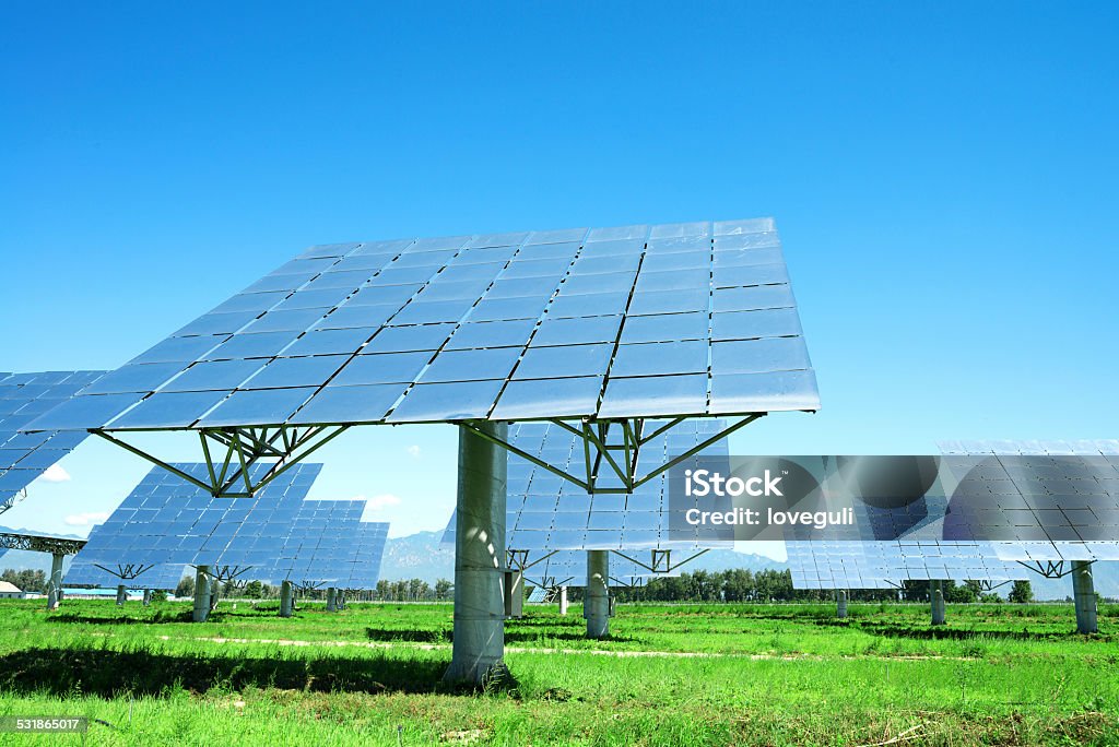 solar panels on grass field 2015 Stock Photo