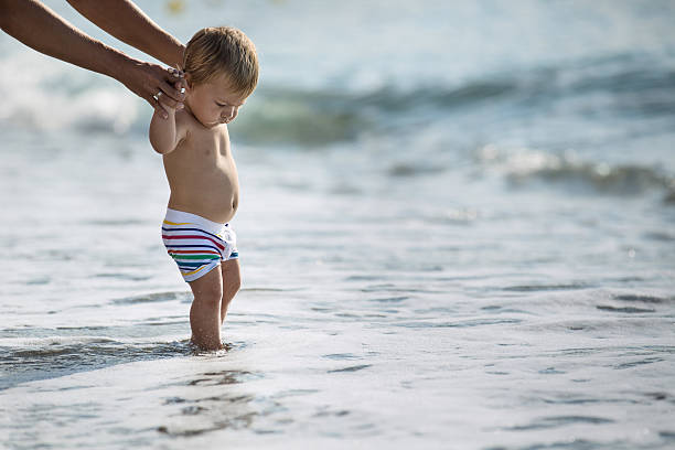 istock Baby and sea 531866097