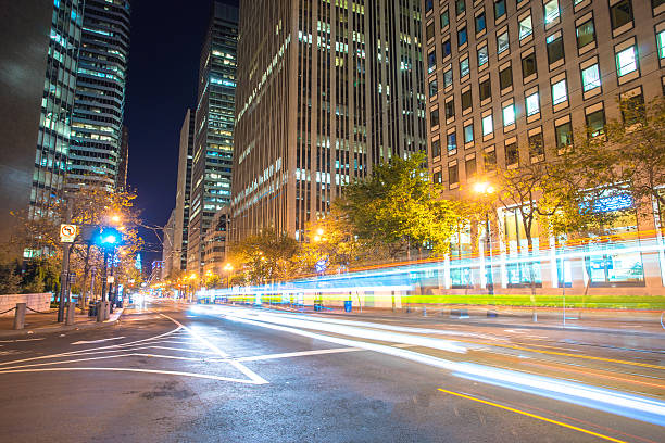 istock traffic on road before modern office buildings 531866394