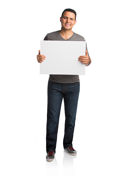 istock Happy man holding placard 531867495