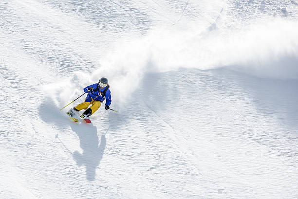 istock Male skier in snow 531867806
