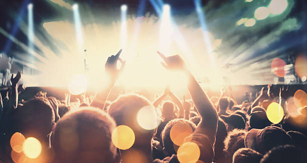 istock People at concert party. 531867890