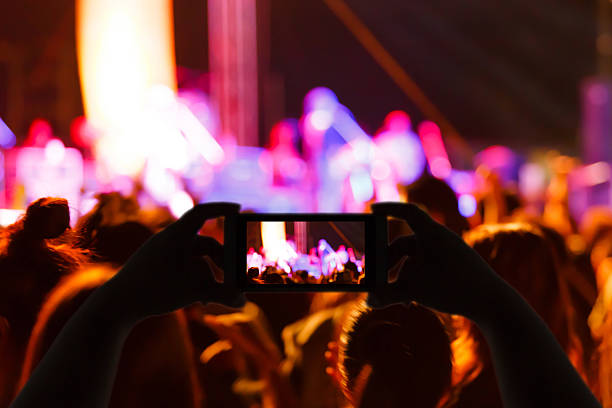 istock Take photo concert in front of stage 531867928