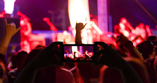 istock Take photo concert in front of stage 531867964